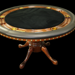Luxury poker tables by Stine Game Tables a round poker table with black felt and green leather