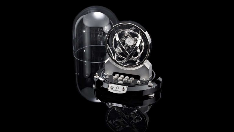 safes by dottling features a watch winder with a black background