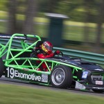 kit car by exomotive a green race car racing on a track