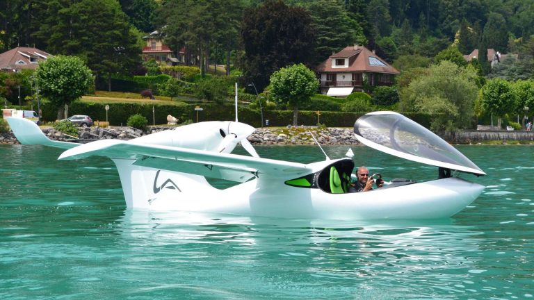 ski plane by Lisa Akoya an aircraft floating on a body of water