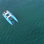 watercraft by Platypus craft shows a blue catamaran type in a large body of water