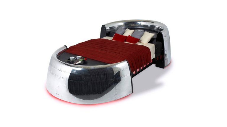 MotoArt Airplane Furniture featuring a bed with red blanket with white background