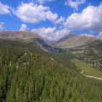 property in breckenridge colorado with beautiful mountains and cloudy blue skys
