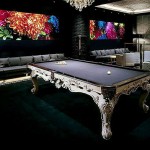 billiards by Olhausen a luxury pool table in a living room on black carpet