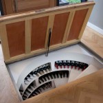 wine cellars by spiral wine cellars features a wine cellar in a floor with hatch door opened