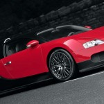 luxury vehicle by Kahn Design a red and black Bugatti