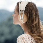 headphone by meze with a woman listening to music while admiring nature