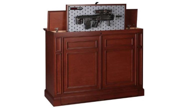 weapon concealment by Tactical Wall Units a gun about to be hidden in a piece of furniture