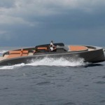 yachts by Vanquish Yachts in the ocean racing another boat | ToysForBigBoys.com