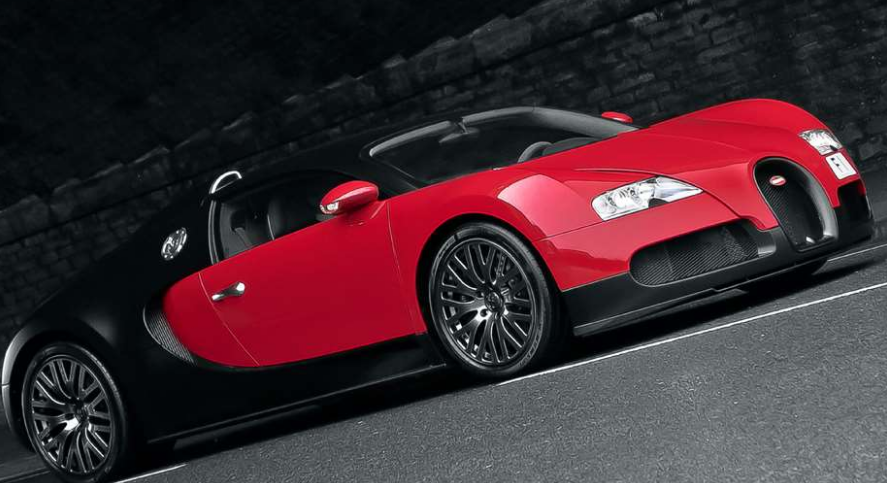 exotic cars red and black Buggatti with top down