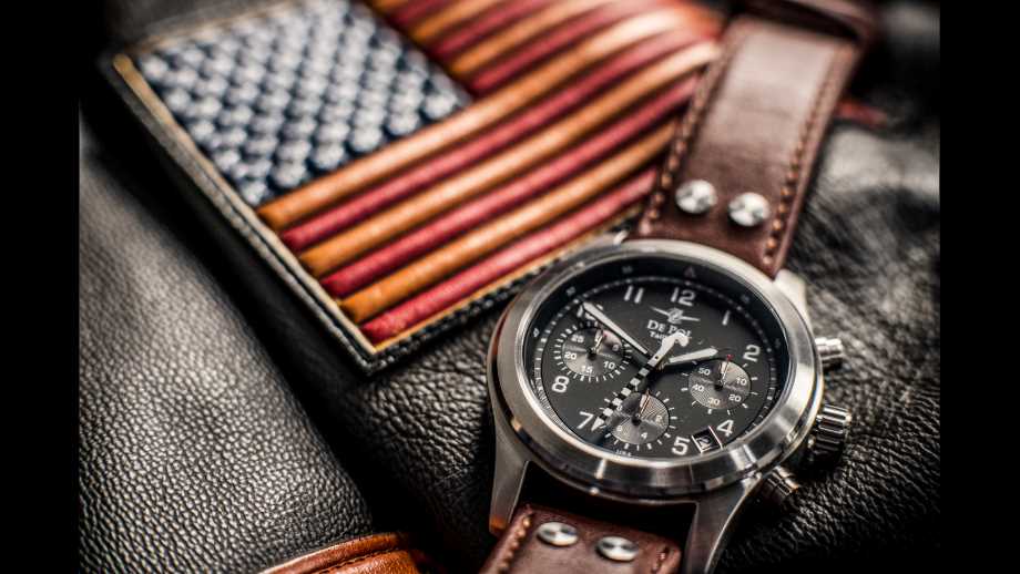 De Pol Watches is a company with a US patch on a leather jacket